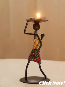 Handcrafted wooden cottage light glowing warmly in a rustic room